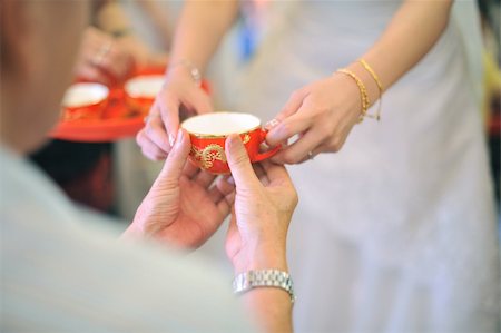 Chinese wedding tea ceremony serving to elders. Stock Photo - Budget Royalty-Free & Subscription, Code: 400-06141576