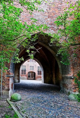 simsearch:400-04375112,k - Arched Entrance to the Courtyard in the Dutch City of Zutphen Stock Photo - Budget Royalty-Free & Subscription, Code: 400-06142107