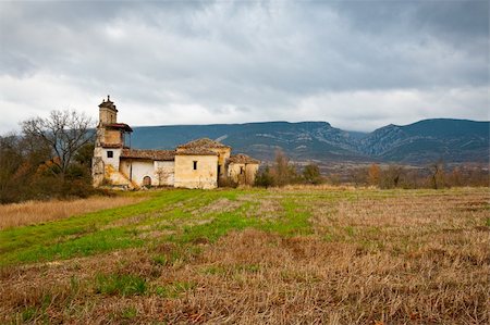 simsearch:400-05711931,k - Medieval Spanish Church Surrounded by Fields in the Rainy Weather Stock Photo - Budget Royalty-Free & Subscription, Code: 400-06142576