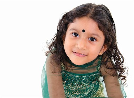 simsearch:400-06389659,k - Little Indian girl looking up over white background Foto de stock - Super Valor sin royalties y Suscripción, Código: 400-06142828
