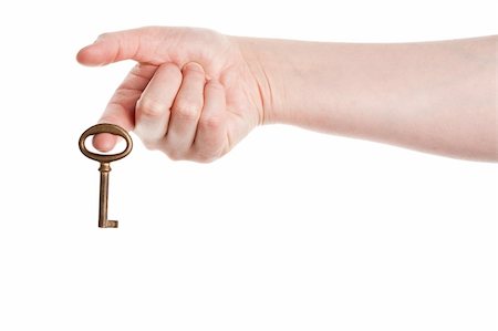 simsearch:400-04852236,k - Hand holding old key isolated on white background Stock Photo - Budget Royalty-Free & Subscription, Code: 400-06175789