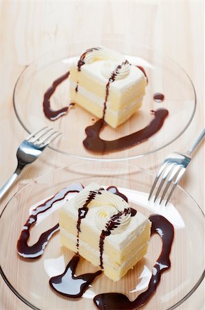 simsearch:400-05173009,k - fresh cream cake closeup with chocolate sauce topping Stock Photo - Budget Royalty-Free & Subscription, Code: 400-06176116