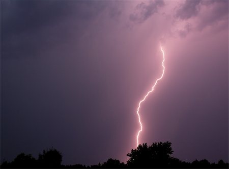 discharge - Single bolt of lightning in a thunderstorm. Stock Photo - Budget Royalty-Free & Subscription, Code: 400-06178521