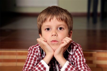 Portrait of the thoughtful boy at home Stock Photo - Budget Royalty-Free & Subscription, Code: 400-06172347