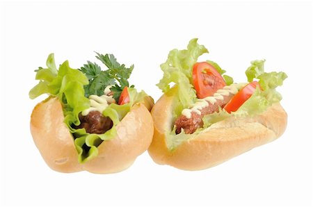 simsearch:400-04587885,k - Two tasty and delicious hotdog. Isolated on white. Stock Photo - Budget Royalty-Free & Subscription, Code: 400-06172358