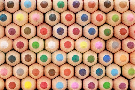 Colored crayons in a stack showing their tops. Stock Photo - Budget Royalty-Free & Subscription, Code: 400-06173098