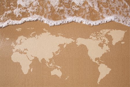 Textured map of the Earth in wet sand Stock Photo - Budget Royalty-Free & Subscription, Code: 400-06173435