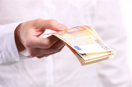 simsearch:400-04011910,k - Female hand holding fifty euro banknotes, closeup view Stock Photo - Budget Royalty-Free & Subscription, Code: 400-06173992