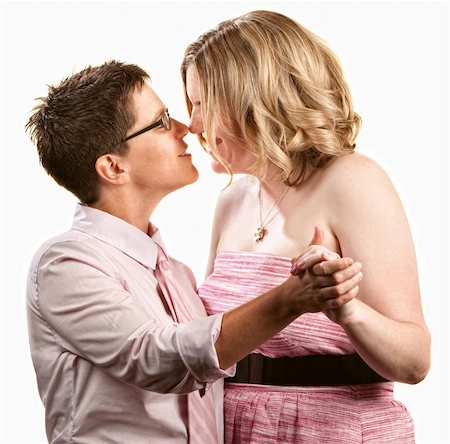 simsearch:400-06204561,k - Two lesbian women dancing together over white background Stock Photo - Budget Royalty-Free & Subscription, Code: 400-06204566