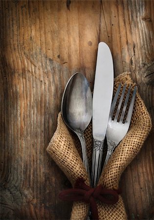 Vintage silverware on rustick wooden background Stock Photo - Budget Royalty-Free & Subscription, Code: 400-06207867