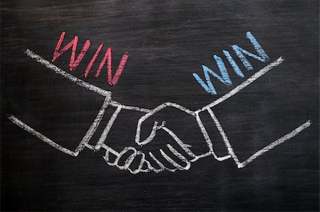 Mutual benefit or win-win concept of handshaking drawn with chalk on a blackboard Stock Photo - Budget Royalty-Free & Subscription, Code: 400-06201374