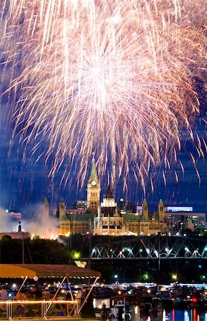 The canadian Parliament in all its glory surrounded by fireworks on Canada Day. Stock Photo - Budget Royalty-Free & Subscription, Code: 400-06202673