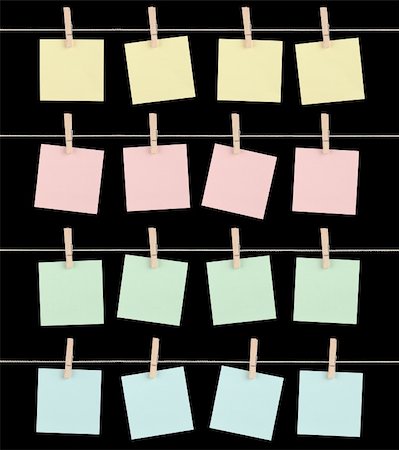 peg - Four sets of blank sticky notes held on strings by clips isolated on a black background. Stock Photo - Budget Royalty-Free & Subscription, Code: 400-06203503