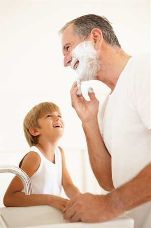 Grandson Watching Grandfather Shaving In Bathroom Mirror Stock Photo - Budget Royalty-Free & Subscription, Code: 400-06203543