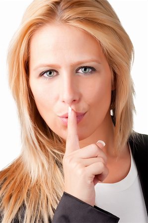 simsearch:400-04175955,k - Business woman with her finger over her mouth, isolated in a white background Stock Photo - Budget Royalty-Free & Subscription, Code: 400-06328674