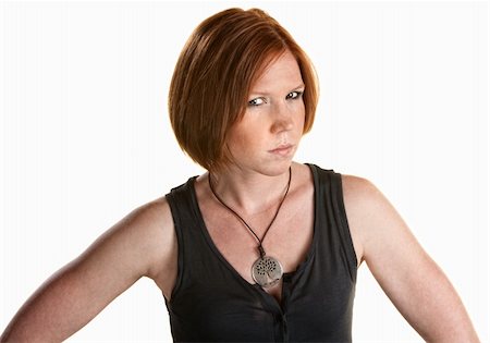 simsearch:400-06363059,k - Annoyed red head female over white background Stock Photo - Budget Royalty-Free & Subscription, Code: 400-06328784