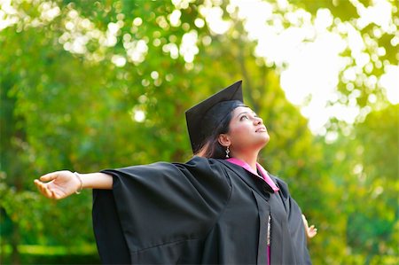 Young Asian Indian female student open arms outdoor on graduation day Stock Photo - Budget Royalty-Free & Subscription, Code: 400-06328862