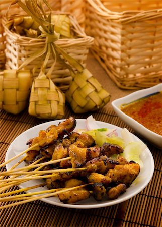 simsearch:400-07418409,k - Asian Malay Ramadan food, satay chicken and ketupat in low light Stock Photo - Budget Royalty-Free & Subscription, Code: 400-06331298
