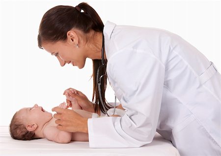 pediatricians office - female doctor checking baby on white isolated background Stock Photo - Budget Royalty-Free & Subscription, Code: 400-06357355