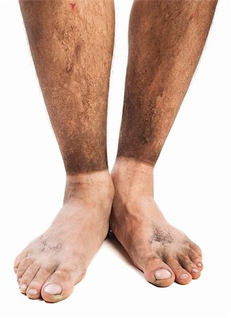 dirty feet in sand and mud with traces of socks Stock Photo - Budget Royalty-Free & Subscription, Code: 400-06364904