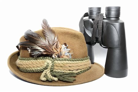 display of a hunting hat and binoculars over white Stock Photo - Budget Royalty-Free & Subscription, Code: 400-06365690