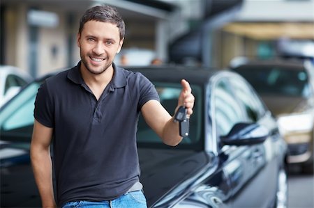 Young man with the keys at the car Stock Photo - Budget Royalty-Free & Subscription, Code: 400-06366590