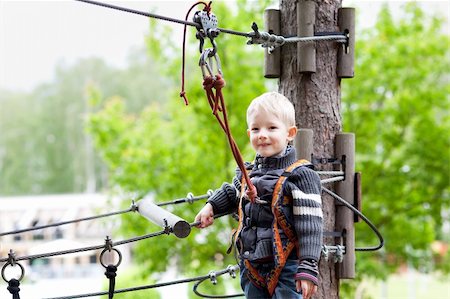 excited little boy ready for a canopy tour Stock Photo - Budget Royalty-Free & Subscription, Code: 400-06367318