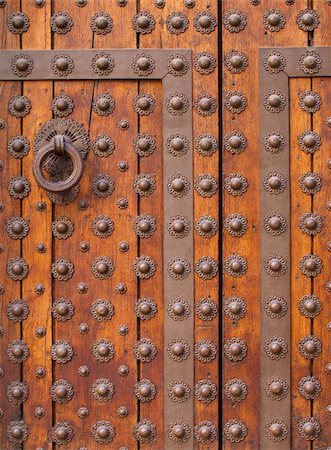 decorative iron - Closeup of old medieval wooden door, gothic style. Stock Photo - Budget Royalty-Free & Subscription, Code: 400-06360736