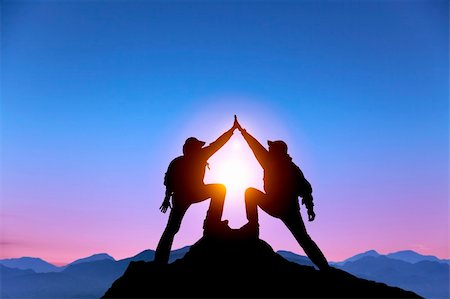 The Silhouette of two man with success gesture standing on the top of mountain Stock Photo - Budget Royalty-Free & Subscription, Code: 400-06360730