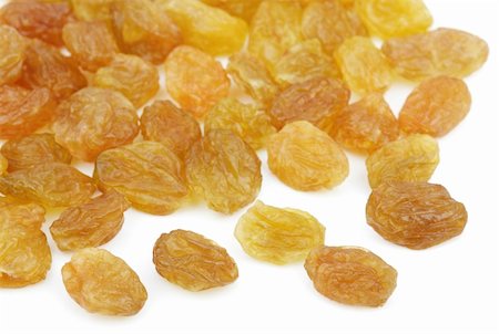 dehydrated - Heap of yellow raisin isolated on white background Stock Photo - Budget Royalty-Free & Subscription, Code: 400-06362878