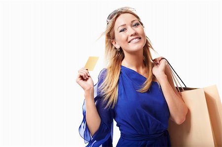 Attractive girl with bags and credit card Stock Photo - Budget Royalty-Free & Subscription, Code: 400-06363168