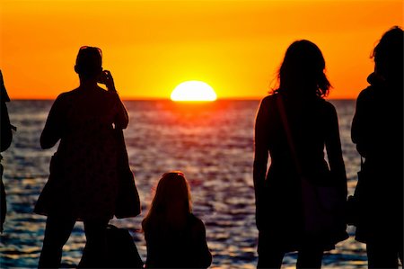 Women silhouette watching sunset on sea coast in Zadar, Dalmatia Stock Photo - Budget Royalty-Free & Subscription, Code: 400-06388324