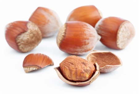 simsearch:400-04833195,k - Group of hazelnuts isolated on white background Stock Photo - Budget Royalty-Free & Subscription, Code: 400-06389100