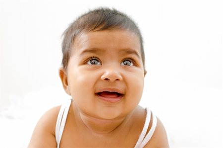 simsearch:400-06389659,k - 6 months old Indian baby girl having thought, looking up Foto de stock - Super Valor sin royalties y Suscripción, Código: 400-06389660