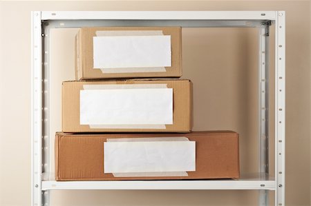 shipping carton - Cardboard boxes with blank labels. Moving, storage concept. Stock Photo - Budget Royalty-Free & Subscription, Code: 400-06389819