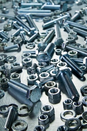 simsearch:400-05240852,k - Screws, nuts, washers on a metal table. Stock Photo - Budget Royalty-Free & Subscription, Code: 400-06389825