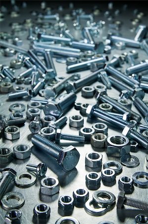 simsearch:400-05240852,k - Screws, nuts, washers on a metal table. Stock Photo - Budget Royalty-Free & Subscription, Code: 400-06389826
