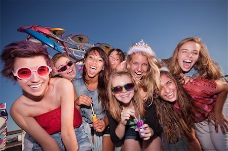 simsearch:400-04099373,k - Mixed group of young girls outside blowing bubbles Stock Photo - Budget Royalty-Free & Subscription, Code: 400-06394247
