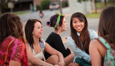 simsearch:400-04099373,k - Diverse group of happy teenage girls sitting and talking Stock Photo - Budget Royalty-Free & Subscription, Code: 400-06394265