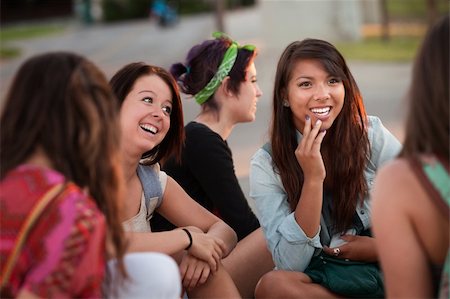 simsearch:400-04099373,k - Interested female teenager in conversation with friends Stock Photo - Budget Royalty-Free & Subscription, Code: 400-06394262