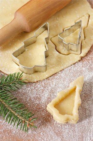 simsearch:400-05721521,k - Christmas baking background dough, cookie cutters, rolling pin. Stock Photo - Budget Royalty-Free & Subscription, Code: 400-06394619