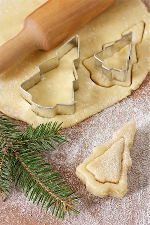 simsearch:400-05721521,k - Christmas baking background dough, cookie cutters, rolling pin. Stock Photo - Budget Royalty-Free & Subscription, Code: 400-06394620
