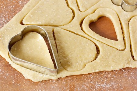 simsearch:400-05721521,k - Heart cookies cutter on raw cookie dough. Stock Photo - Budget Royalty-Free & Subscription, Code: 400-06396250