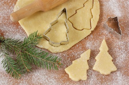 simsearch:400-05721521,k - Christmas baking background dough, cookie cutters, rolling pin. Stock Photo - Budget Royalty-Free & Subscription, Code: 400-06396785