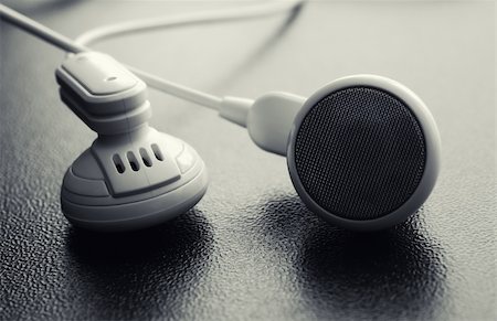 podcast - Macro image of headphones on wood texture Stock Photo - Budget Royalty-Free & Subscription, Code: 400-06390072