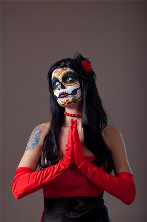 Praying Sugar skull girl in red evening dress and gloves Stock Photo - Budget Royalty-Free & Subscription, Code: 400-06391701