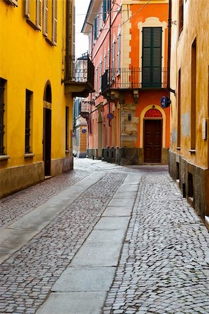 simsearch:400-06530910,k - Narrow Alley with Old Buildings in the Italian City of Cuneo Stock Photo - Budget Royalty-Free & Subscription, Code: 400-06392641
