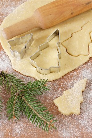 simsearch:400-05721521,k - Christmas baking background dough, cookie cutters, rolling pin. Stock Photo - Budget Royalty-Free & Subscription, Code: 400-06393756