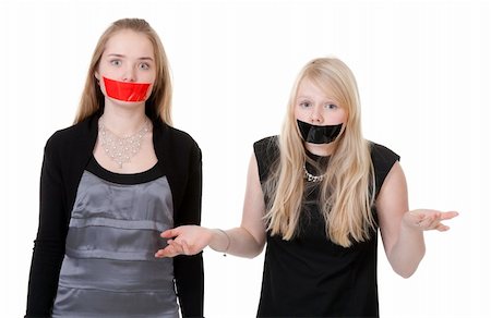 simsearch:400-04175955,k - Two beautiful girls with their mouths taped with tape Stock Photo - Budget Royalty-Free & Subscription, Code: 400-06408400