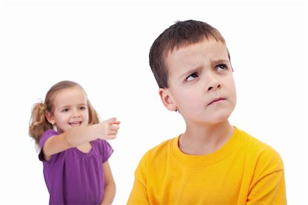 Bullying concept - girl mocking an upset young boy, isolated Stock Photo - Budget Royalty-Free & Subscription, Code: 400-06408440